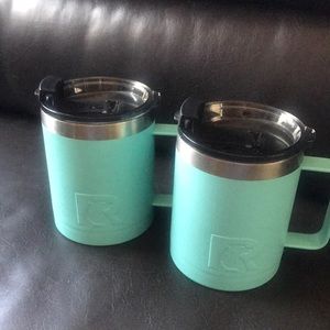 Pair of insulated mugs.
